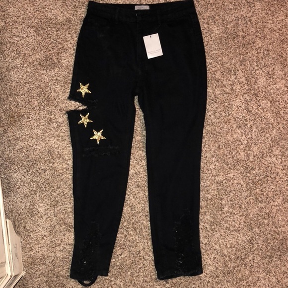 Black Distressed jeans with gold stars on right leg - Picture 1 of 7